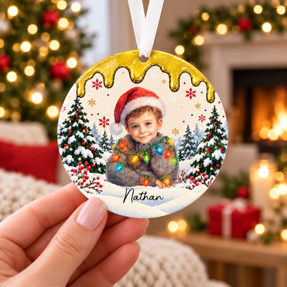 Close-up of personalized Nathan Christmas portrait ornament held in a hand — square banner