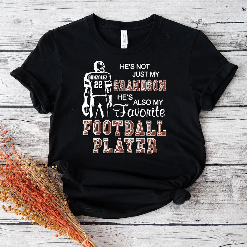 Custom He's Not Just My Grandson He's Favorite Football Player Shirt, Personalized Sports T-Shirt, Game Day Shirt, Football Mom Gift dbccd4e6-66c4-454b-969b-f1e516aa76f4-dff-2-.webp