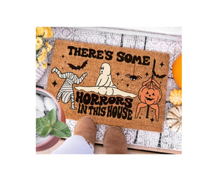 There's Some Horrors In This House Doormat, Funny Ghost Pumpkin Door Mat, Halloween Welcome Mat, Spooky Season Halloween Front Door Mat f2a717f5-520f-4a24-816b-18cd9ed3bcd0-rtertderg-2-.webp