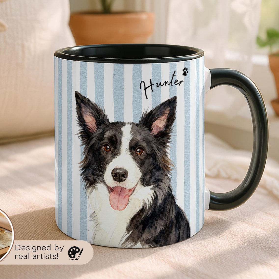 Mug with a dog illustration on a striped background, placed on a surface with plants in the background.
