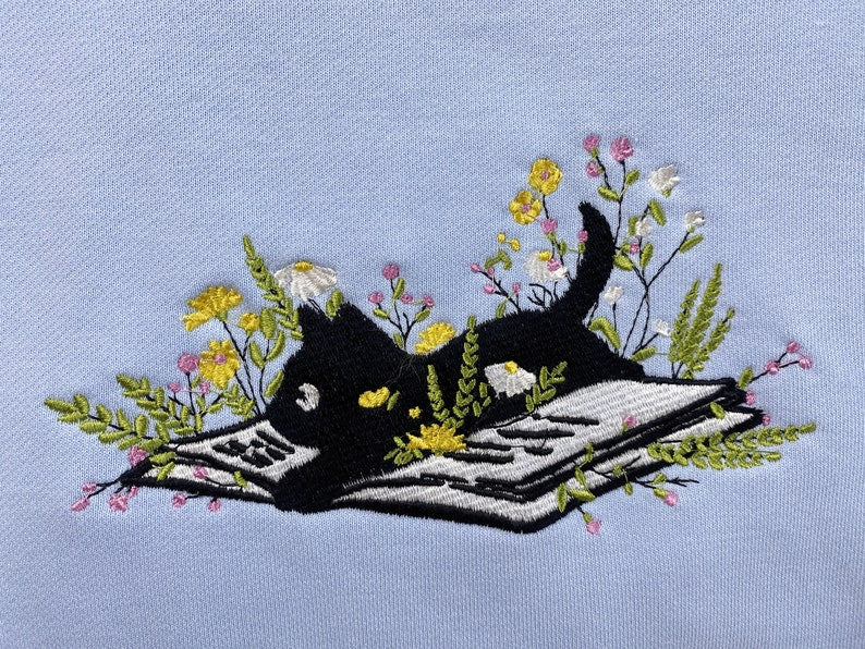 Embroidered Cute Cat Lying On Book With Flower Sweatshirt | Flower With Cat Embroidered Hoodie | Book Lover T-Shirt | Crew Neck Sweatshirt il_794xN.5421257214_tn3r.jpg