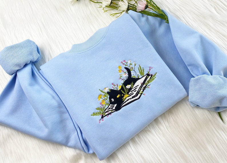 Embroidered Cute Cat Lying On Book With Flower Sweatshirt | Flower With Cat Embroidered Hoodie | Book Lover T-Shirt | Crew Neck Sweatshirt il_794xN.5469388705_6ynn.jpg