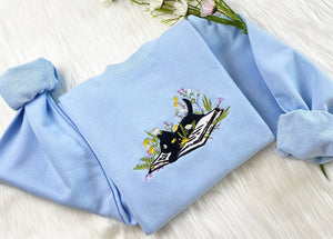 Embroidered Cute Cat Lying On Book With Flower Sweatshirt | Flower With Cat Embroidered Hoodie | Book Lover T-Shirt | Crew Neck Sweatshirt il_794xN.5469388705_6ynn.jpg