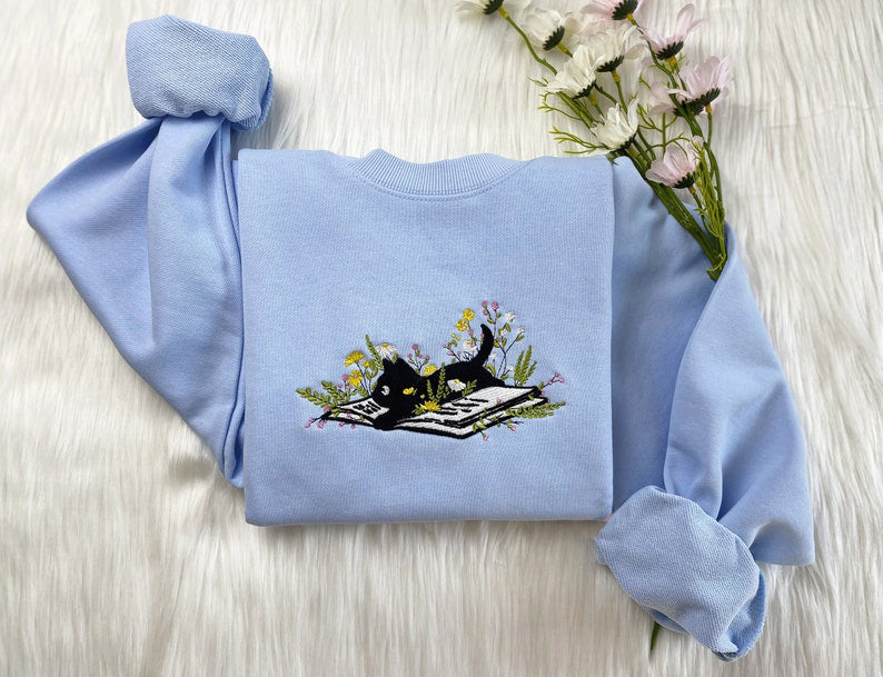 Embroidered Cute Cat Lying On Book With Flower Sweatshirt | Flower With Cat Embroidered Hoodie | Book Lover T-Shirt | Crew Neck Sweatshirt il_794xN.5469431997_8004.jpg