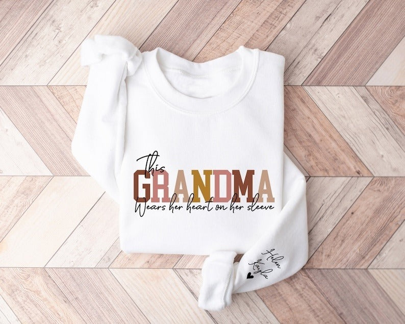 Custom This Grandma Wears Her Heart On Her Sleeve Sweatshirt, Personalized Mimi Hoodie With Grandchilds Names, Nana Outfit, Mothers Day Gift