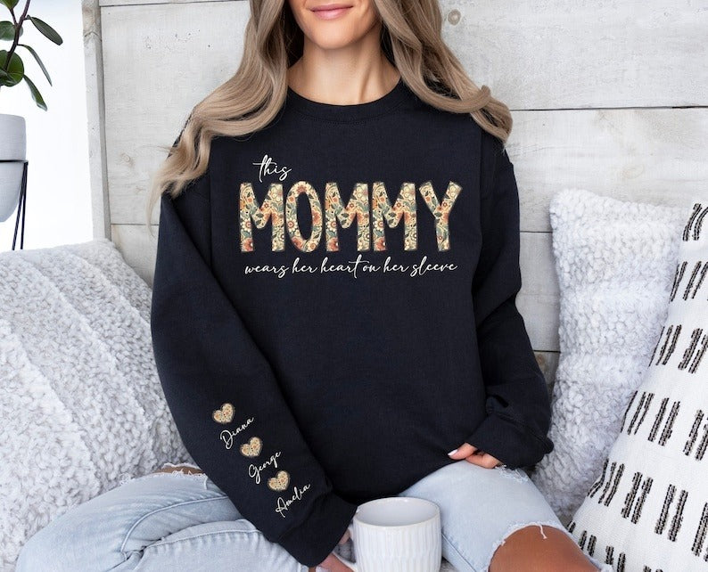 Custom This Grandma Wears Her Heart On Her Sleeve Sweatshirt, Shirt with Names On Sleeve, Mommy Heart Hoodie, Valentine's Day Grandma Gift