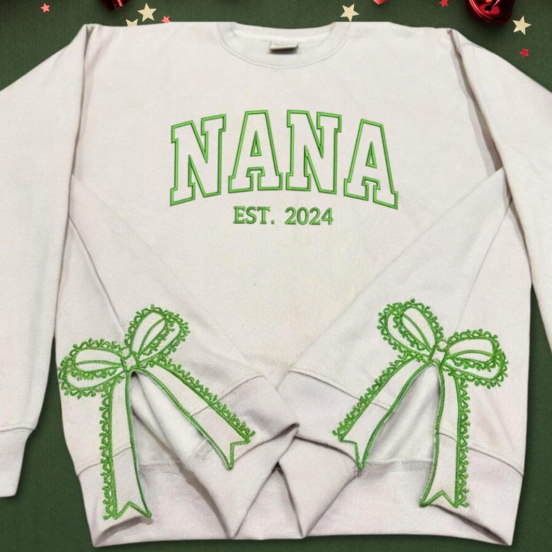 Custom Nana Est Embroidered Christmas Bow Embellished Shirt, Colorful Custom Side Bow Cut-Out Sweatshirt, Christmas Gift Hoodie