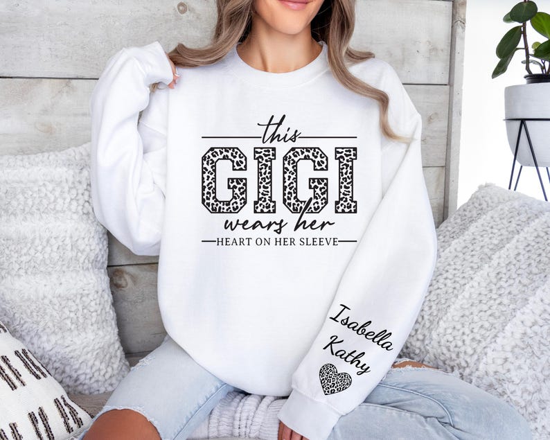 Custom Gigi Sweatshirt,Custom Grandma Gift, This Gigi Wears Her Heart On Her Sleeve Sweater,With Kids Name On Sleeve, Gigi Sweater,Gigi Gift