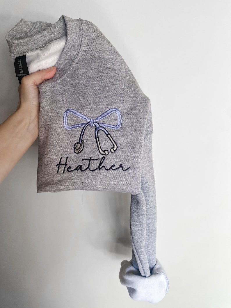 Embroidered Stethoscope Sweatshirt, Nurse Sweatshirt, Personalized Nurse Sweatshirt, Coquette Bow, Custom Nurse Sweatshirt, Bow Sweatshirt il_794xN.6723290969_6jds.jpg