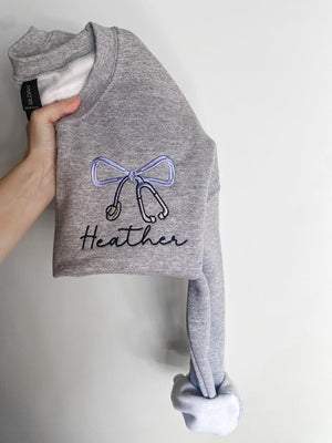 Embroidered Stethoscope Sweatshirt, Nurse Sweatshirt, Personalized Nurse Sweatshirt, Coquette Bow, Custom Nurse Sweatshirt, Bow Sweatshirt il_794xN.6723290969_6jds.jpg