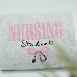 NURSING STUDENT Embroidered Hoodie, Bow Stethoscope, Nursing Sweatshirt, Embroidered Sweatshirt, Nursing School Gift Crewneck il_794xN.6792652230_ncuj.jpg