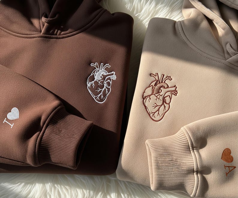 Custom Embroidered Couple Sweatshirt With Anatomical Heart & Sleeve Initials, Personalized Matching Hoodie Gift For Anniversary Hoodie