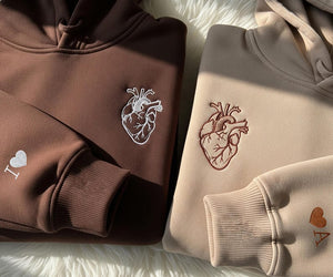 Custom Embroidered Couple Sweatshirt With Anatomical Heart & Sleeve Initials, Personalized Matching Hoodie Gift For Anniversary Hoodie