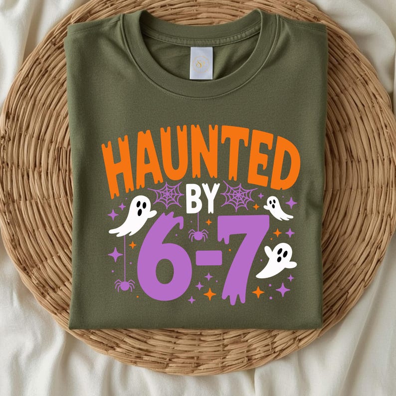 Haunted by 6 7 Halloween Unisex Shirt, Spooky Meme Tee, Viral TikTok Funny Phrase, Ghostly Internet Joke, Scary Social Media Trend