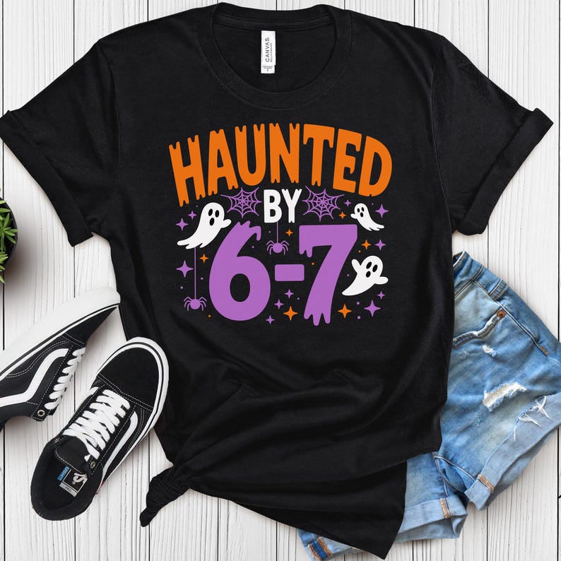 Haunted by 6 7 Halloween Unisex Shirt, Spooky Meme Tee, Viral TikTok Funny Phrase, Ghostly Internet Joke, Scary Social Media Trend