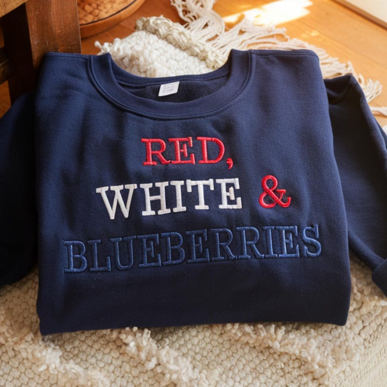 Embroidered Red, White, Blueberries Sweatshirt Charlie Kirk Tribute quote Sweatshirt Charlie Kirk Freedom Champion Shirt Charlie Kirk Tee il_794xN.7251891421_69jp.jpg