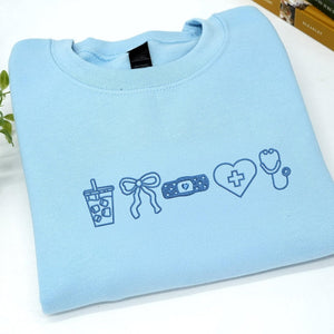 Embroidered Nurse Sweatshirt - Coquette Bow, Personalized CNA Crewneck - Nursing Student Sweatshirt For Her il_794xN.7276167832_nq48.jpg