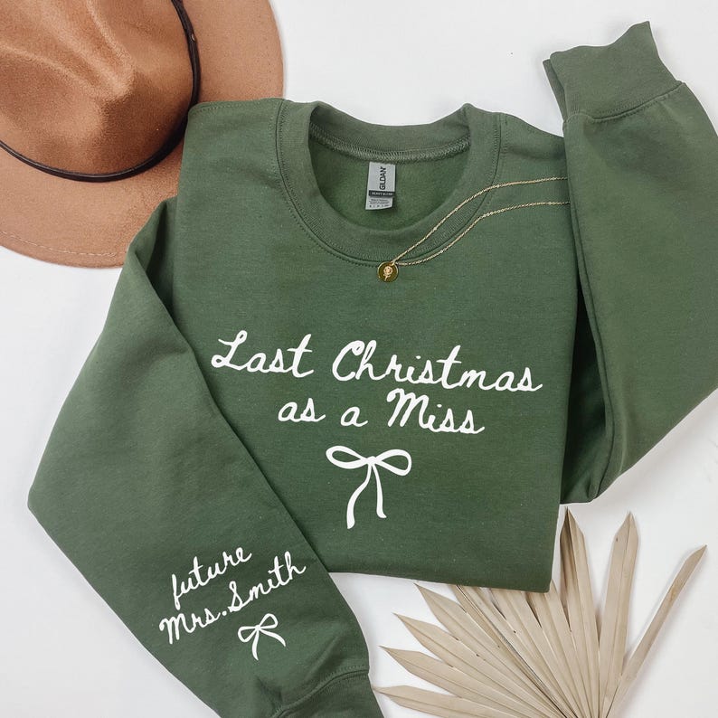 Last Christmas As a Miss Sweatshirt, Christmas Hoodie with a Bow on the Sleeve, Red Bow Design Christmas Sweatshirt, Christmas Gift For Her