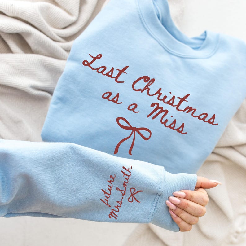 Last Christmas As a Miss Sweatshirt, Christmas Hoodie with a Bow on the Sleeve, Red Bow Design Christmas Sweatshirt, Christmas Gift For Her