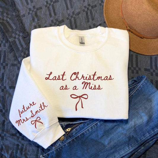 Last Christmas As a Miss Sweatshirt, Christmas Hoodie with a Bow on the Sleeve, Red Bow Design Christmas Sweatshirt, Christmas Gift For Her