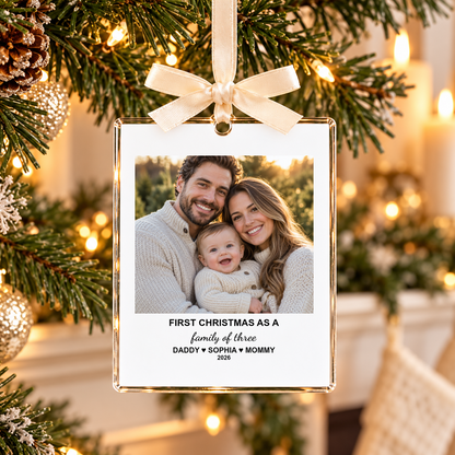 Personalized family photo ornament by a Christmas mantel